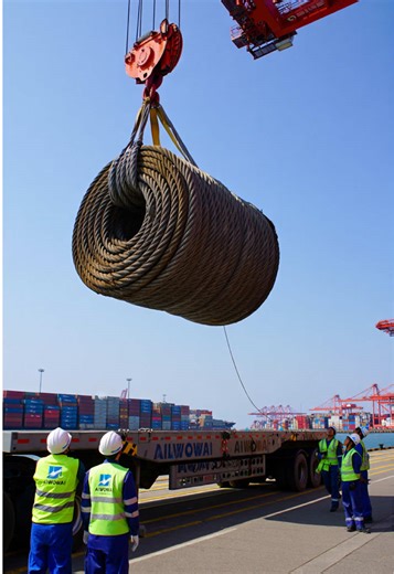 One Small Failure… Huge Port Accident During a routine loading operation at a busy container port, a giant coil of steel cable is lifted high above a truck trailer. The workers guide the crane operator carefully, but suddenly the lifting rigging fails. The enormous cable coil slips and falls while workers shout warnings. #portlife #craneoperator #industrialwork #heavyequipment #aiwowai