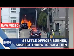 Raw Video: Seattle officer and cruiser set on fire