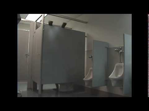 Jason Bourne shits over a stall