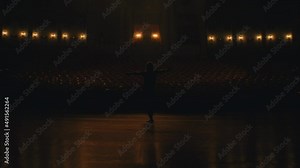 Dancer enjoy ballerina motion in light jumping. Beautiful woman ballerina perform ballet in white leotard close up dancer opera train flexibility body 4K. Pretty female ballet girl stage theater turn.