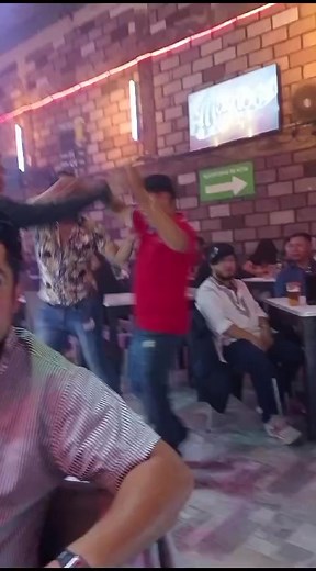Lively Indoor Gathering at a Vibrant Bar or Pub