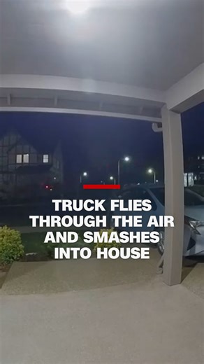 Police in Tigard, Oregon, arrested a man after his truck went flying through the air and into a house. | CNN