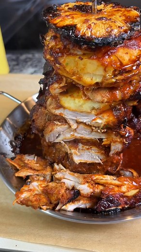 Chicken Al Pastor 💙 #recipes #chickenalpastor #tacos #mexicanfood Marinade: 1 tbsp oil 1/2 white onion Handful garlic cloves 8 chili guajillos 1 chili de arbol 1/4 c apple cider vinegar 2 c chicken broth 1 small can pineapple w/the juice 2 tbsp salt 1 tsp cumin 1 tbsp chipotle pepper powder 1/2 tbsp black peppercorn 2 tsp dried oregano 2-3 oz achiote paste 2 bay leaves 1/2 small can chipotle chilis in adobe 2-3 lbs chicken thighs 1 fresh pineapple sliced Bake @ 350° F 2-3 hours or until interna