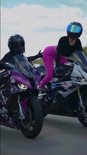 two girls ride bike race together with the way
