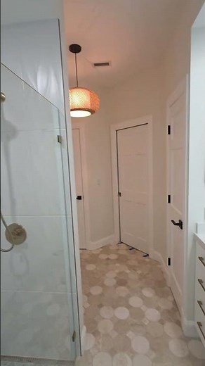 Open Concept Master Bathroom Layout with Curbless Walk-In Shower and Stone Tile