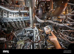 Inspection of a gas turbine engine using a Video Endoscope. Search for defects inside the turbine and shooting on video, photos using a measuring inst Stock Photo - Alamy