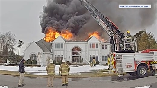 Police officers rescue dog from burning Egg Harbor Township home