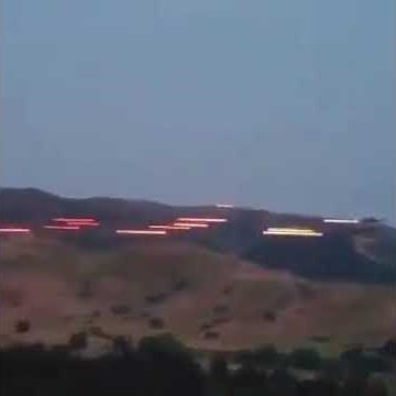 MILITARY ATTACK HELICOPTERS FIRING TRACERS ROUND FROM GATLING MACHINE GUN!