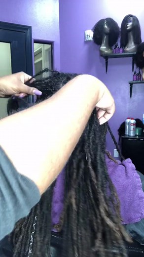 Creative Dreadlock Styling in a Chic Salon