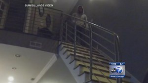 Surveillance video shows intruder watching Chicago couple sleep