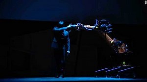 Engineer dances onstage with robot he programmed