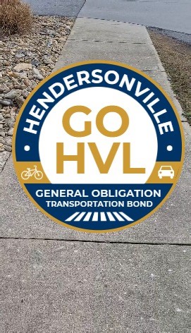 City of Hendersonville residents will vote on a Transportation General Obligation (GO) Bond in the upcoming primary election. If approved, the City would issue up to $10 million to fund transportation improvements, including: 🚛 Repaving nearly 25 miles of City streets ♿ Upgrading curb ramps to improve ADA accessibility 🚴 Adding sidewalks, multi-use paths, and intersection safety upgrades Learn more by watching the video or visiting the City’s website — and don’t forget to vote on March 3! | He