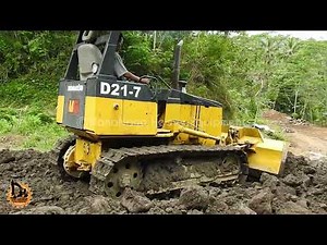 D21-7 Komatsu Mini Dozer Grading Aggregate on a New Road Construction