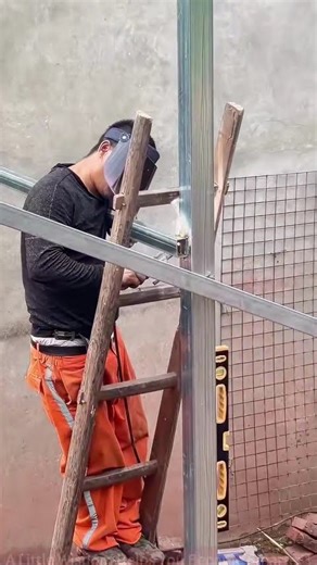 The welder welded the ladder inside.