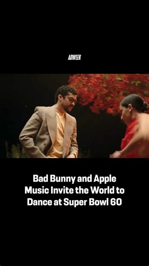El mundo bailará 💃 Apple Music released the official trailer for Bad Bunny's game day performance. Filmed entirely in Puerto Rico, the spot features Bad Bunny dancing beneath the Flamboyant tree, a vibrant symbol of the island. The soundtrack is his 2025 song “Baile Inolvidable.” Diverse people of all ages step in as Bad Bunny’s dance partners throughout the film, which “serves as an open invitation, welcoming the entire world—no matter who you are or where you are from— to join Bad Bunny” for 