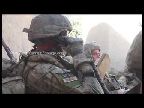War in Afghanistan - Radio operator calling in air strike archival stock footage