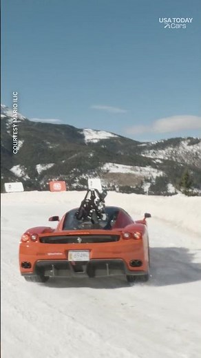 Follow this Ferrari as it races across a snowy track