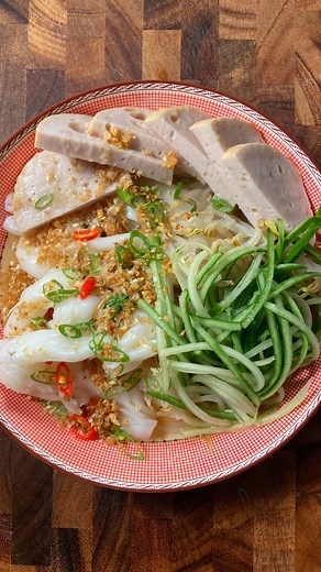 Let’s make one of Vietnam’s most popular breakfast dishes! GroovyFoodiess Everytime I’m back home in Vietnam, I always opt to grab this super-accessible breakfast from a local food cart. It’s so quick and easy to recreate at home, not to mention delicious!! INGREDIENTS -½ lb bean sprouts -1 lb pre-made steamed rice sheet noodles -¼ lb chả lụa (Vietnamese ham) -1 English cucumber -2 Tbsp fried garlic Nuoc Mam Sauce -1 cup hot water -¾ cup granulated sugar -3 tablespoons lime juice (about 1 lime) 