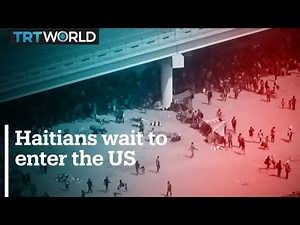 Thousands of Haitians gather at Mexico border to cross into US