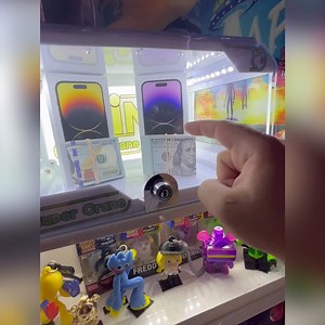 6.3M views · 112K reactions | 2 iPhones Locked Inside Claw Machine  | TYE Arcade | Facebook