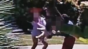 Father swings toddler like a baseball bat