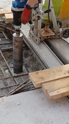 Concrete Coring Drill drilling a Vertical Core