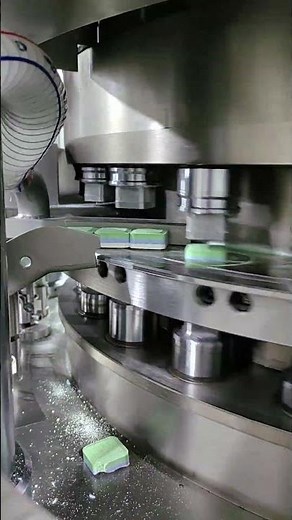 Nice Triple-layer dishwasher tablet making machine is pressing colorful dishwasher tablets