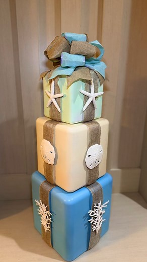 96K views · 1.2K reactions |  Coastal Christmas Gift Stack — Beautiful Dollar Tree DIY Using Stackable Presents | Crafty Beach | Facebook