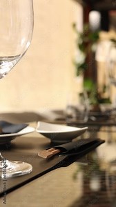 process of table setting for a banquet in a restaurant