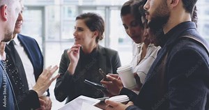 Planning, ideas and talking business people using technology in a group meeting. Group of corporate professionals brainstorming and discussing together at the office and holding phones and tablets