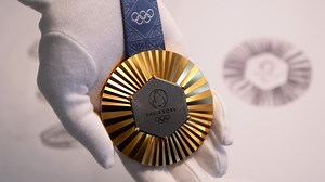 The Paris Olympics medals are monumental. They're embedded with pieces of the Eiffel Tower