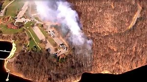 PHOTOS: Montgomery County Fire Department battles large brush fire in Germantown