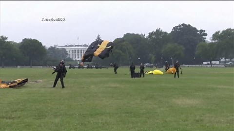 President Trump receives flag from soldier who parachutes onto White House ellipse