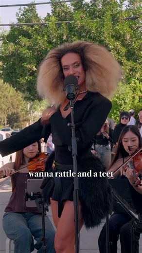 😳Where did she find this band?! #shorts #livemusicla #busking #stringquartet