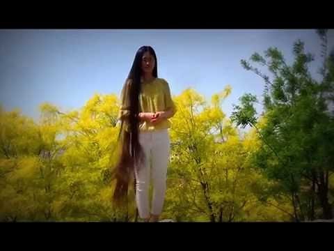 knee long hair blowing in the wind