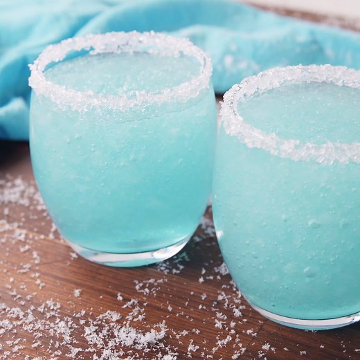 Jack Frost would DEFINITELY get tipsy off of these. Full recipe: http://dlsh.it/p8kOVJo Don't have blue curacao? Buy online now: http://amzn.to/2By6BtA | Delish