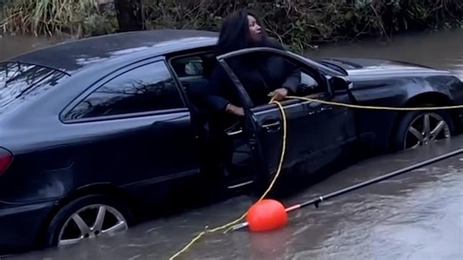 Fire crew 'rescue' a woman after getting stuck in shallow water