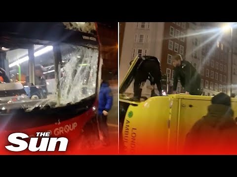 Ambulance FLIPS OVER after crash with London double decker bus