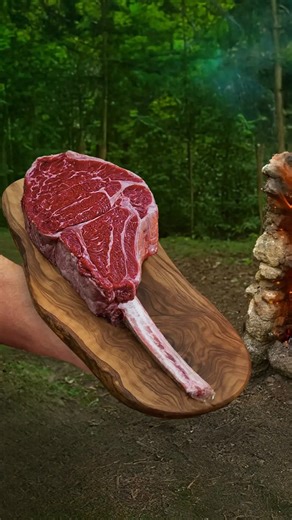 Cook Loop | Outdoor Cooking | Fire & Meat 🔥 on Instagram: "🪓 Primitive Tomahawk Steak in a Handmade Stone Oven | Outdoor Cooking Perfection . . . . #fyp #viral #foodie #reels #yum #tomahawksteak #primitiveoven #outdoorchef"