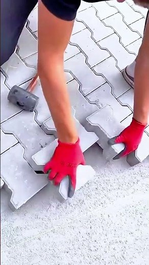 Laying Interlocking Bricks with Precision Creating a Smooth and Durable Pavement Surface