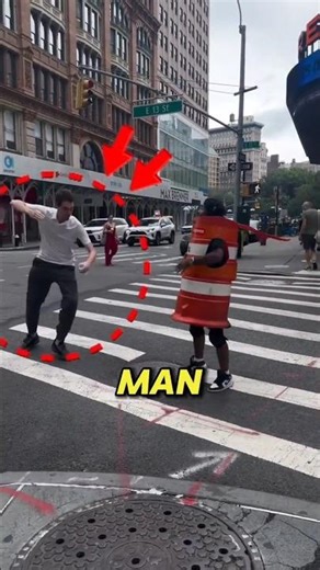 man hides in traffic barrel 🤣#shorts #songlyrics