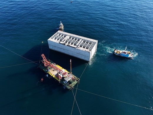 Tower-sized ‘mega caisson’ sunk for Genoa’s new breakwater - Global Construction Review