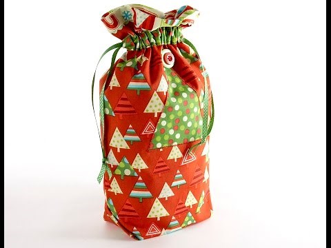 Drawstring Christmas sacks for you to sew by Debbie Shore