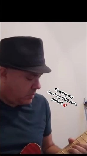 Playing my Sterling SUB Axis guitar today!!