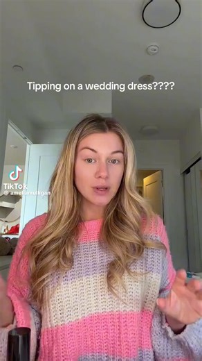 She said YES to the dress… then got hit with a surprise that left her stunned.After finding her dream gown, worth THOUSANDS; she’s handed a sheet at checkout asking for a tip percentage.Not a few dollars.Not a small thank you. 20%… which would’ve been $800.She just stared at it like… is this real life?For the first time ever; she left NO TIP.Now the internet is divided:Some say the stylist deserved it after hours of help.Others say tipping on a luxury purchase has gone way too far.Tipping cultur