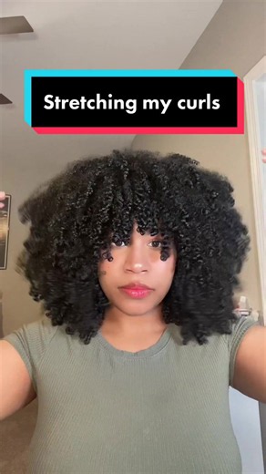 Stretching natural curls with a blow dryer technique