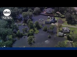 Florida homes swamped, cars abandoned, roads washed out after severe flooding