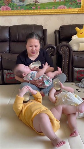Adorable Triplet Milk Time with Grandma 💛 #baby #triplets #familymoments