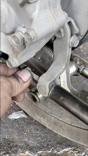 How to remove the locking bolt for the motorcycle drum brake adjustment lever