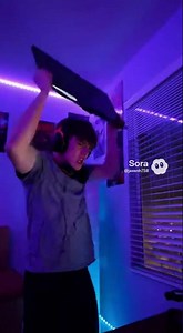 man raging over a game a broke his keyboard and monitor